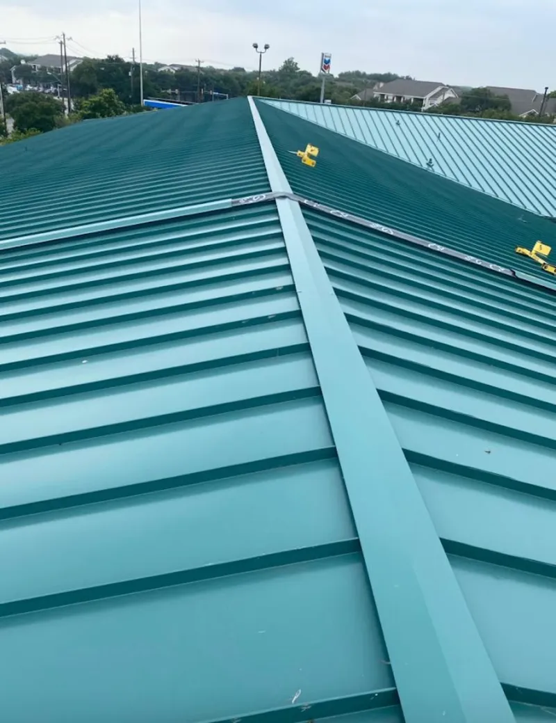 Green commercial metal roof ridge and valley for Metal Roof Repair in Old Saybrook